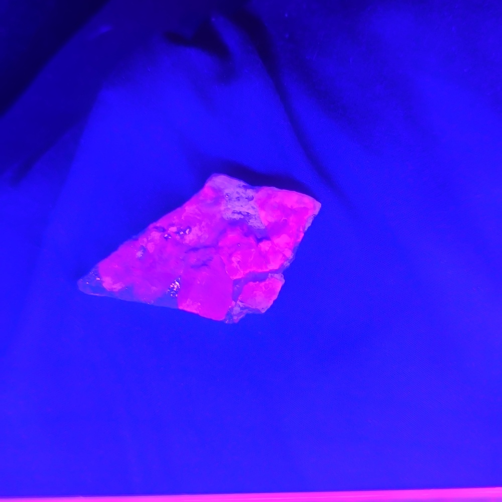 Vibrant Blue UV Reactant Afghanite Mineral Specimen with Sparkling Inclusions
